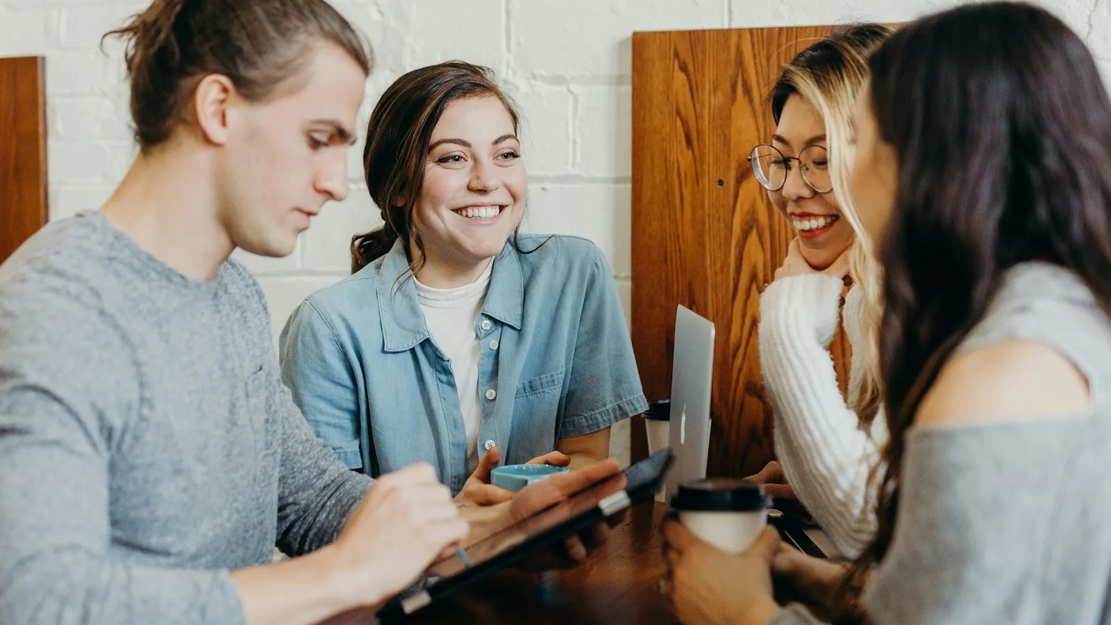 Students talking around a table